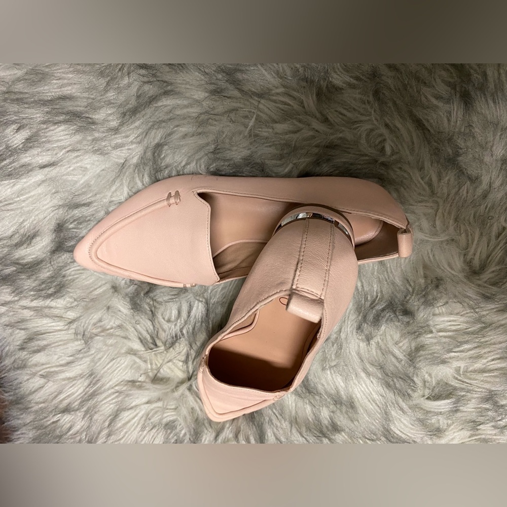 blush franco sarto flats with pointed toe and silver detail in the heel